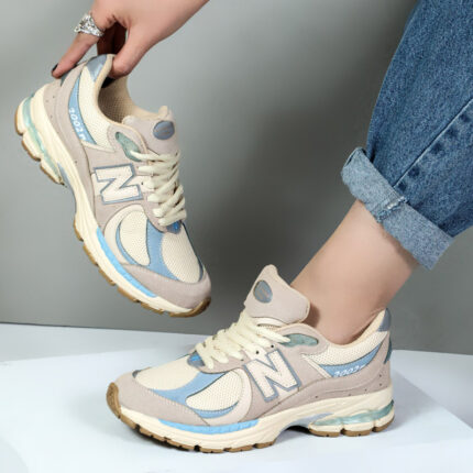 کتونی نیوبالانس زنانه اسپرت مدل 2002R رنگ کرم آبی کد 78922